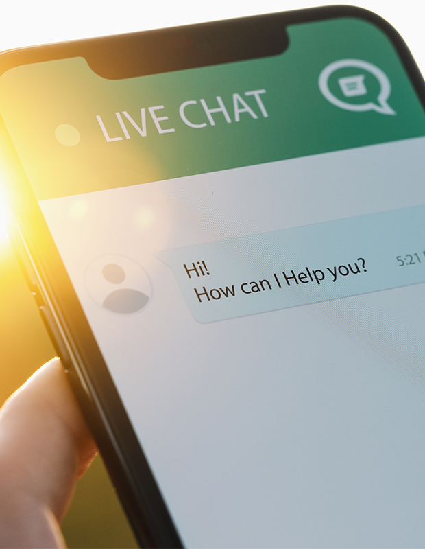 A person chatting with a bot on their phone