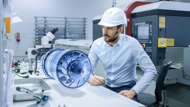 Augmented reality for training and development in manufacturing Man using augmented reality in manufacturing