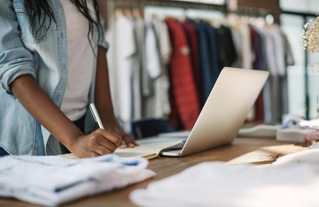 designer checking clothing inventory retail industry, retail store planning, designer checking clothing inventory