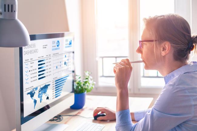 Businesswoman looking at business analytics