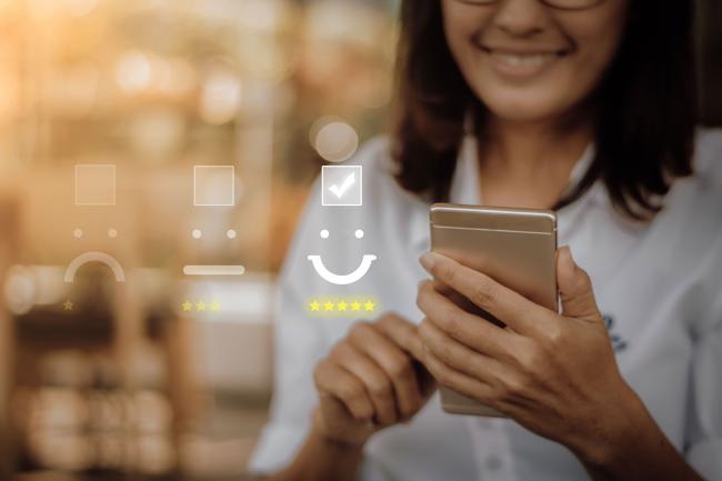 Positive customer experience CX smiley face good rating