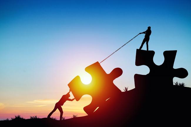 Strategic partnership with your Outsourcing Provider Partners put puzzle together business concept