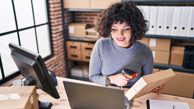 The connected supply chain woman at desk