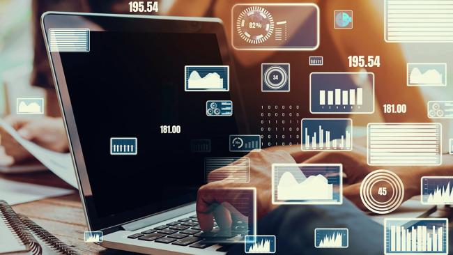 8 steps for successful ERP implementation Laptop with facts and figures overlaid