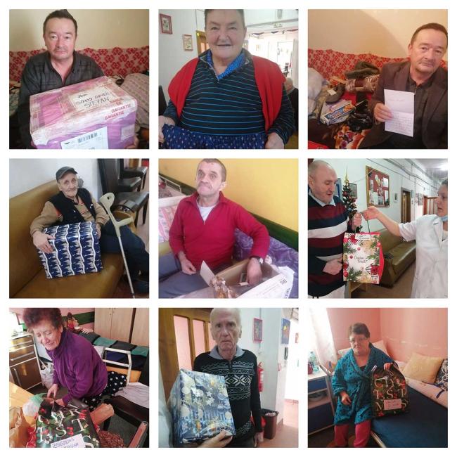 Sharing good company and cheer with a retirement home Residents open gifts from CGS Romania staff