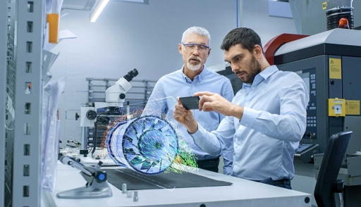 Two workers engage in training with augmented reality