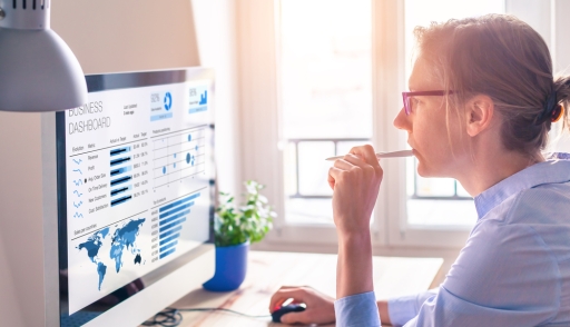 Businesswoman looking at business analytics