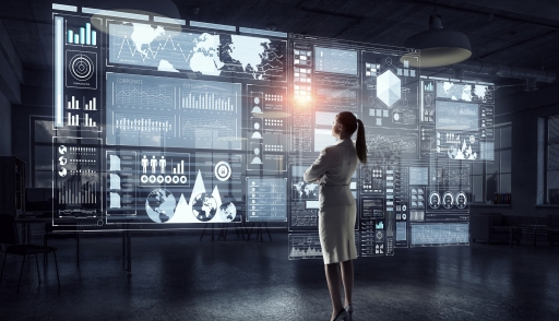 Woman looking virtual monitors showing customer data privacy implementation