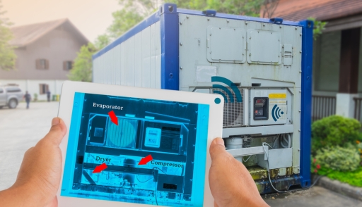 Hand holding tablet with AR maintenance application