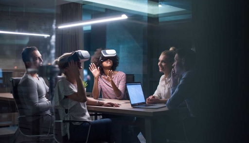 Staff use group virtual reality technology in the office