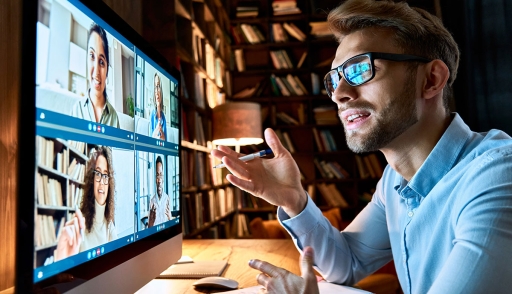 Employee on video call with coworkers