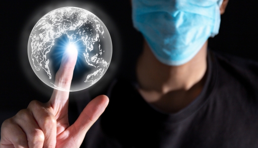 man wearing mask touch 3d graphic earth with light effect