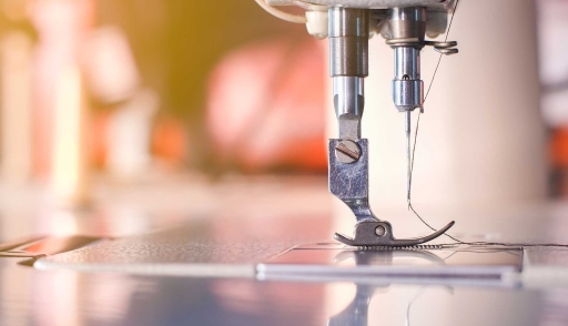 Close-up of sewing machine needle
