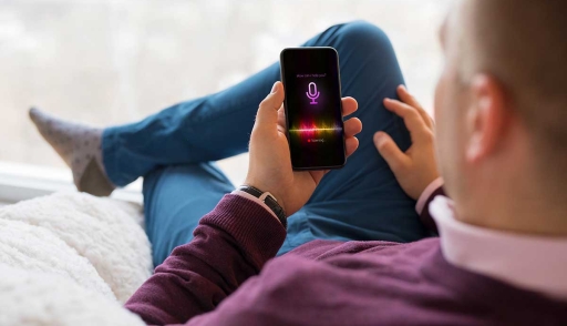Man using virtual assistant on smartphone
