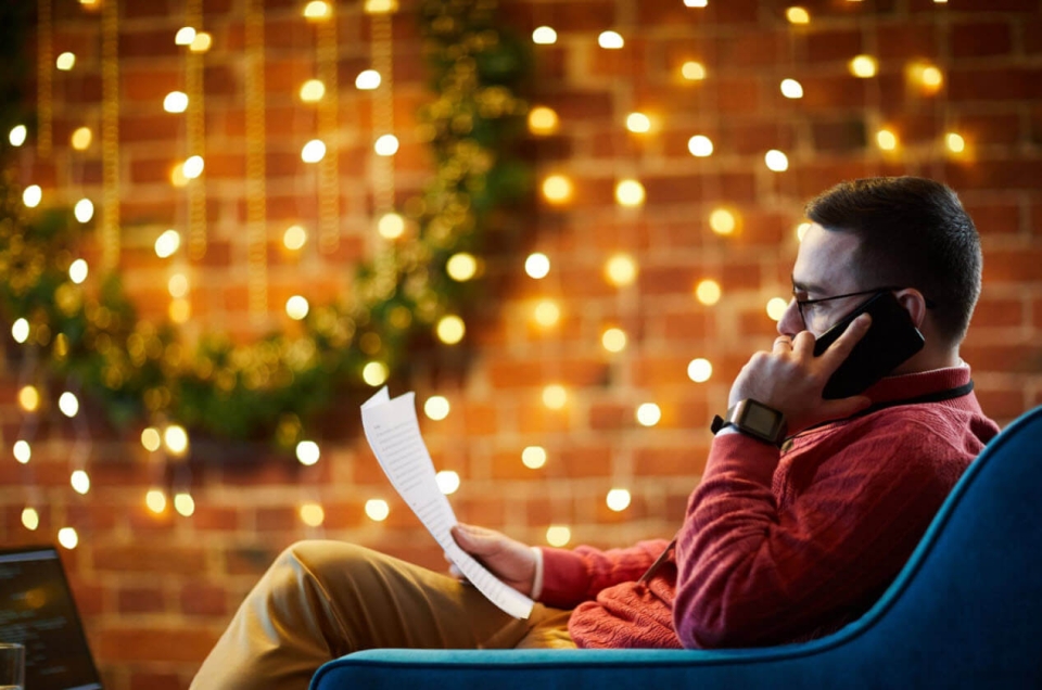 A man talking to a call agent during the high sales season of the holidays